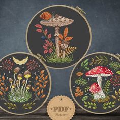 three cross stitch kits with mushrooms and plants