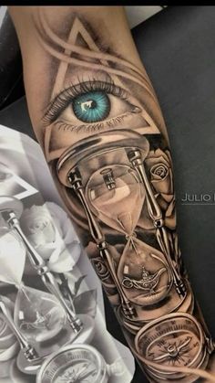 a tattoo with an eye and hourglass on the arm, next to a clock