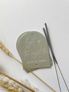 a pair of scissors next to a tag that says, let it be the night