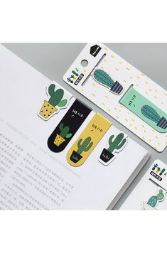 two bookmarks with cactus stickers on them