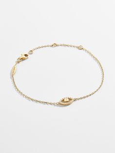 Carry around something with a little extra protection, like our Ojo 18K Gold Bracelet. This delicate gold chain bracelet features an intricate evil eye bead in the center. Even better, this piece is crafted with 18K gold plated sterling silver and Cubic Zirconia stones. Elegant Evil Eye Bracelet With Adjustable Chain, Elegant Gold Evil Eye Bracelet With Diamond Details, Elegant Gold Evil Eye Bracelet With Diamond Eyes, Elegant Gold Plated Evil Eye Bracelet, Elegant Adjustable Yellow Gold Evil Eye Bracelet, Elegant Everyday Evil Eye Bracelet, Elegant Round Chain Bracelet With Evil Eye, Gold Bracelets With Diamond Eyes As A Gift, Adjustable 14k Gold Evil Eye Bracelet