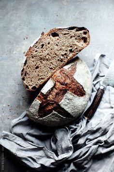 a loaf of bread sitting on top of a piece of paper