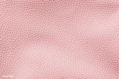 the texture of pink leather is shown in close up, as if it were made from natural materials