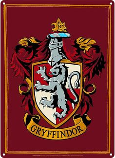 a red and yellow flag with the crest of a hogwarts house on it