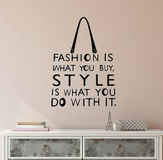 a wall decal that says fashion is what you buy style is what you do with it