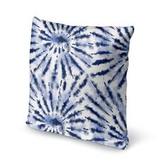 a blue and white tie dye pillow on a white background with the word's logo