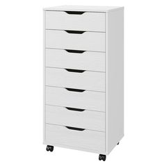 a white dresser with five drawers on wheels