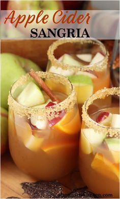 Stemless wine glasses with rims dipped in sugar, with apple cider sangria, chunks of red and green apples, oranges and cinnamon sticks. Alcohol Free Sangria, Apple Sangria Recipes, Wine Sangria Recipe, Apple Cider Sangria Recipe, Fall Sangria Recipes, Moscato Sangria, Caramel Apple Sangria, White Wine Sangria Recipe