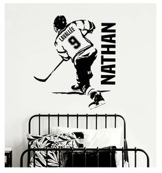 a wall decal with the name nathan on it