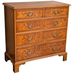 an old wooden dresser with many drawers