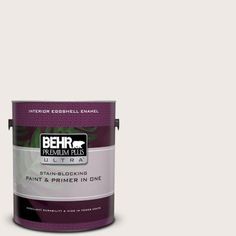 a paint can with the words behrr on it and an image of a dog