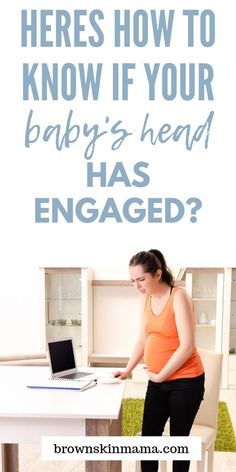 a woman standing in front of a laptop computer on top of a desk with the words, heres how to know if your baby's head has engaged?