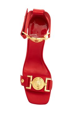 Make a modern statement in this lofty sandal featuring dramatic goldtone hardware and a curved wedge heel. 3 1/2" heel, 3 1/2" shaft (size 8.5) Adjustable hook-and-loop ankle strap Synthetic upper/ synthetic and leather lining/synthetic sole Imported Luxury Red Sole Wedge Sandals, Luxury Red Wedge Heels, Silky Black Hair, Red Wedge Heels, Formal Red-sole Wedge Heels, Red Wedge Sandals, Gold Leather Wedge Sandals With 4-inch Heel, Red Wedges, Red Open-toe Synthetic Wedge Sandals