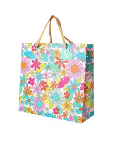 a colorful shopping bag with flowers on it