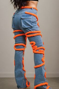 Embrace your daring fashion sense with these striking denim pants, a bold choice for those who crave attention. The timeless blue denim acts as a canvas for the dynamic orange piping that dances along the legs in a winding, organic motif. Not only does it inject a pop of color, but it also creates a sense of motion and texture. The high-waisted design flatters your form, while the sleek silhouette tapers towards the ankles, accentuating your curves. Suitable for casual occasions or bold enough f Bodysuit Blouse, Bandage Dress Bodycon, Snake Patterns, Crop Top Shirts, Plus Size Swimsuits, Swimsuit Cover Ups, Premium Denim, Vibrant Orange, Classic Blue