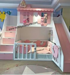 a child's bedroom with pink and white furniture, stairs to the loft bed