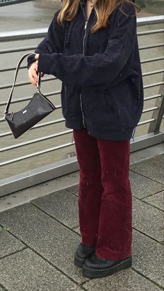 Red Flared Leggings Outfit, Red Corduroy Flare Pants Outfit, Red Velvet Jeans Outfit, Purple And Maroon Outfit, Red Velour Pants Outfit, Dark Red Trousers Outfit, Maroon Courderoy Pants Outfit, Red Curdory Pants Outfit, What To Wear With Plum Pants