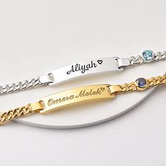 Make lasting memories with this beautiful baby bracelet, the perfect gift for a new born or a new mom. Featuring an engraved name and a genuine birthstone, this timeless bracelet is a perfect way to commemorate any special occasion. An elegant and tasteful gift idea that can be enjoyed for years to come. Please send us in the request box above: Put your personalization details, preferred ICON & FONT, and Birthstone hereEg: Alice + Icon 2 + Font 1 • Word limits: 8 characters/side • Default font is font 5 • Please measure the baby's wrist. Age guide is based on average size only. P R O D U C T • I N F O ✅ MATERIAL: High Quality Solid 925 Sterling Silver with 18K Gold, Rose Gold-Plated. ✅ DIMENSION: The plate charm measures approx. 1 1/4" (32mm) in length and 1/4" (6.5mm) in width. ✅ BRACELET