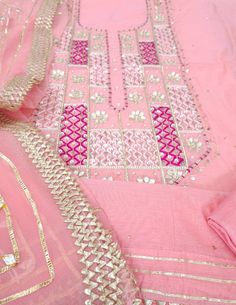 Item Overview ATHARVA Hand Embroidered Salwar Kameez in Pink/Chiffon Gota Patti Dupatta/Custom Stitch Unstitch/Anarkali/Churidar/Tunics/Plazzos/ Dno. CH1575 Fabric: * Shirt Chanderi Silk - Embroidered Neck / 2.5 Mts Beautiful Hand Embroidere Neck. * Dupatta: Chiffon Chinnon Dupatta- 2.5 Mts- Gota Patti Work * Bottom Santoon Silk 2.5 Mts. Excusive Hand Embroidered Party Wear Punjabi Suit. Customization: * Fabrics Customization: Designs Can be made in different Fabrics. *Color Customization: Desig Semi-stitched Pink Lawn Suit With Dabka Work, Festive Chinon Lawn Suit With Mirror Work, Unstitched Festive Lawn Suit With Mirror Work, Unstitched Lawn Suit With Mirror Work For Eid, Pink Georgette Lawn Suit Straight Kurta, Festive Pink Lawn Suit With Dabka Work, Designer Lawn Suit With Mirror Work For Navratri, Pink Embroidered Georgette Lawn Suit, Pink Anarkali Lawn Suit With Dabka Work