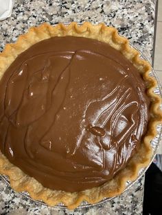 a chocolate pie sitting on top of a counter