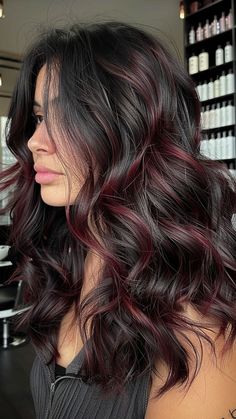 Get the Burgundy Hair of Your Dreams: 25 Expert Ideas for a Stylish Makeover | Lookosm Black And Burgundy Highlights, Hair Dye Ideas Burgundy, Subtle Hair Highlights For Black Hair, Black Hair With Subtle Red Highlights, Black With Dark Red Highlights, Burgundy Streaks In Brown Hair, Dark Brown Hair With Colorful Highlights, Subtle Red Highlights In Black Hair, Hair Colour Inspo For Black Hair