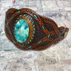 Handmade Green Leather Bracelet, Green Leather Artisan Jewelry, Adjustable Turquoise Leather Bracelet In Rustic Style, Adjustable Rustic Turquoise Leather Bracelet, Green Bohemian Bracelets With Patina, Handmade Adjustable Bohemian Leather Bracelet, Bohemian Festival Bracelet With Patina, Bohemian Jewelry With Patina As A Gift, Bohemian Turquoise Inlay Cuff Bracelet