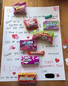 valentine's day candy is laid out on a paper