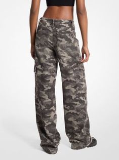 These denim jeans boast so many military-inspired details—from the camouflage print to the large cargo pockets. They’re made from cotton in a comfortable wide-leg silhouette that will team well with sneakers or boots. To finish the look, style them with a cropped tee and bomber jacket. Grey Camo Pants, Pinterest Wardrobe, Denim Cargo Pants, Grey Camo, Pants Denim, Acid Wash Jeans, Camo Pants, Camouflage Print, Trouser Pants Women