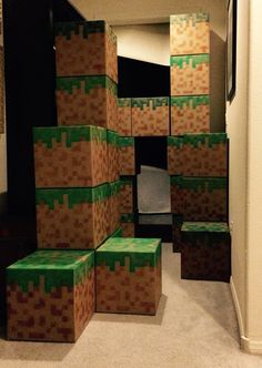 several boxes stacked on top of each other in the middle of a room with carpet