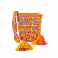 Luxury Mochilas by LUXCHILAS MiniChila Fine - Single Threaded Wayuu Luxury Mochila Bag This beautiful bucket style bag is handwoven for more than 80 hours by women from the Wayuu Tribe. This is the finest quality of the Wayuu mochila. Wear shoulder or cross-body Drawstring with tassels 100% acrylic yarn Size Mini: W x H 23 x 17 cm - 9 x 6.5" Braided strap: Strap drop 54 cm - 21" Handmade in Colombia 🇨🇴 Fair Trade Part of the proceeds is donated to feed the children of the Tribe Mochila Bag, The Tribe, Yarn Sizes, Braided Strap, Acrylic Yarn, Fair Trade, Bucket Bag, Cross Body, Tassels