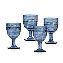 four blue goblets sitting next to each other