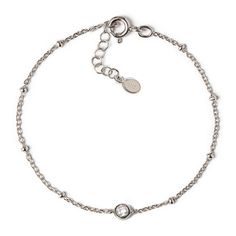 This dainty bracelet is minimal and elegant. Features a sparkly solitaire crystal linked onto an Italian bead chain. .925 Sterling Silver Cubic Zirconia Crystal, 4mm Hypoallergenic, lead and nickel free Length: 5.75-6.75in(14.6-17cm), 6.75-7.75in(17-19.6cm) Handcrafted in NYC #B040 Delicate Gold Bracelet, Bridesmaid Bracelet Gift, Dainty Gold Bracelet, Bridal Party Jewelry, Silver Bracelets For Women, Back Necklace, Dainty Bracelet, Chain Bracelets, Bridesmaid Bracelet