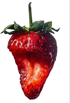 a large red strawberry with green leaves on it's tip and water droplets all over the fruit