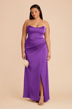 a woman in a purple dress