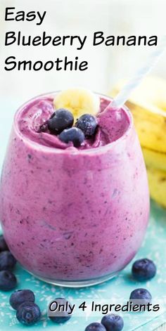 blueberry banana smoothie in a glass with bananas on the side