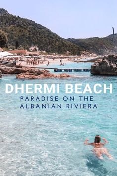 a woman swimming in the ocean with text overlaying her reading dhermi beach paradise on the alban riviera