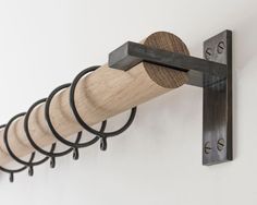 a wall mounted wine bottle rack with six corks