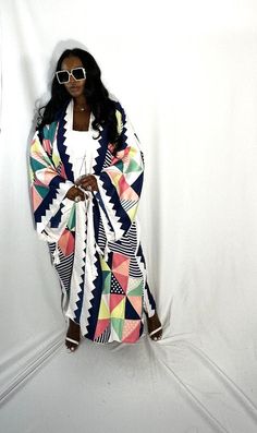 Rich Auntie at it's finest! Our fashion satin kimono can be worn as an oversized dress on it's own or cinched at the waist for a more fitted look. Flowy and colorful style definitely can make this a beach coverup or vacation look. In One Size fits most as the sleeves are open flowy and the kimonos have an open front. Size US Size One Size Chic White Kimono With Kimono Sleeves, White Long Kimono One Size, White Long One-size Kimono, Long White One-size Kimono, White Oversized Long Kimono, Oversized Long White Kimono, White Oversized Robe For Spring, White Oversized Spring Robe, Oversized White Spring Robe