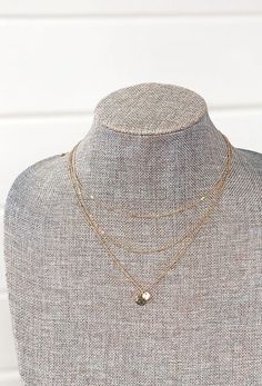 Amaya Layered Necklace Gold Layered Necklace With Round Pendant, Gold Layered Necklace With Round Pendant And Double Chain, Dainty Gold Coin Necklace For Layering, Gold Dainty Coin Necklace For Layering, Chain Necklace With Coin Pendant For Layering, Dainty Gold Layered Charm Necklaces, Gold Coin Pendant Necklace For Layering, Dainty Gold Multi-strand Layered Necklace, Gold Chain Necklace With Coin Pendant For Layering