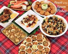 a table topped with lots of different types of food on plates and bowls next to each other