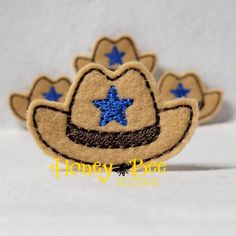 a felt cowboy hat with blue stars on it