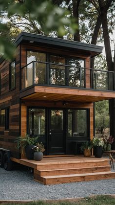 a modern tiny house built in the woods