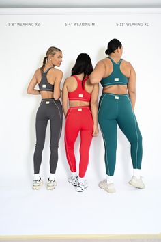 The Aster Contour Sports Bra is our versatile, everyday sports bra. Finished with a racer back design and accents of white contoured piping, the Aster bra delivers medium support to adapt to any activity. Racer back tank fit Thin, white contouring piping Ruby red coloring Medium impact support Scoop neckline Made of our VERSA fabric: smooth, buttery, and form fitting 85% polyamide, 15% spandex Please note: all pieces in the Recess collection will ship within an estimated two weeks of ordering (o Contour Leggings, Sport Tank, Squat Proof, Colby, Back Design, Waist Pants, Racer Back, Ruby Red, High Waisted Leggings