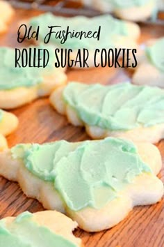 old fashioned rolled sugar cookies with green frosting on a wooden surface and text overlay that reads old fashioned rolled sugar cookies