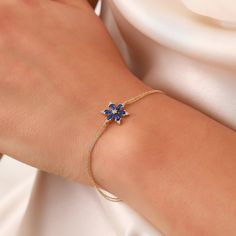 Tiny Sapphire Bracelet, Real 14K Gold Flower Sapphire Bracelet, Dainty initial Sapphire Bracelet, Handmade 14K Gold Anniversary Bracelet, Dainty Custom Bracelet, Anniversary Bracelet, Birthday Gift, Christmas Gift, Solid Gold Bracelet, Minimalist Gold Bracelet, Wedding Bracelet, Valentine's Day Gift "Material: SOLİD GOLD (No Gold Filled Or No Gold Plated)" "KARAT: 14K (585) "Bracelet Length: 14,8 MM "Bracelet Width: 12,9 MM "Available Gold Color: (Yellow Gold, White Gold, Rose Gold) "The certifi Gold And Blue Bracelet, Anniversary Bracelet, Gold Flower Bracelet, Blue Sapphire Bracelet, Bracelets With Meaning, Solid Gold Bracelet, Bracelet Christmas, Bracelet Box, Bracelet Minimalist