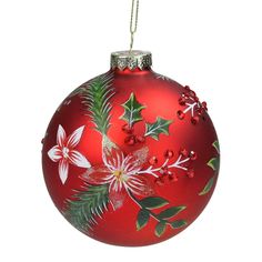 a red christmas ornament with holly and berries