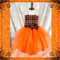 This sweet plaid and tulle inspired dress is perfect for any special occasion, or even as a cute and puffy play dress. The special girl in your life will want to twirl all day in this beautiful dress. Dress would also be perfect for a fall flower girl dress.   This dress is made with soft cotton fabric, tulle and is professionally lined and serged and comes with a cute matching bow.   Dress can be made sleeveless like shown, with short sleeve or long sleeves. In the personalization box please let me know the sleeve length for your dress.  This dress is pictured with a petticoat to show details. If you would like the fullness and puffiness like the picture, please select the with petticoat option.  * Placement : Each dress is custom made so the pattern placement will vary for each dress. Ma Halloween Fitted Tulle Princess Dress, Fitted Tulle Princess Dress For Halloween, Halloween Tulle Princess Costume Dress, Halloween Costume Tulle Dress, Halloween Tulle Tutu Dress For Dress-up, Halloween Tulle Dress For Dress-up, Halloween Tulle Tutu Dress, Orange Tulle Tutu Dress For Party, Orange Tulle Tutu Party Dress