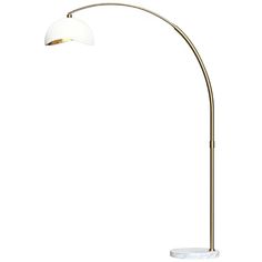 a floor lamp with a white shade on the top and a gold metal base, in front of a white background