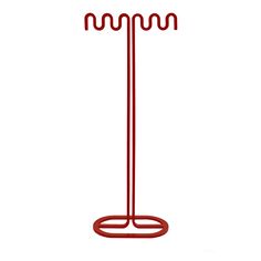 a red metal stand with four hooks on it's sides and one hook in the middle