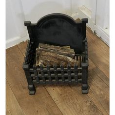 an old wooden chair with logs in it